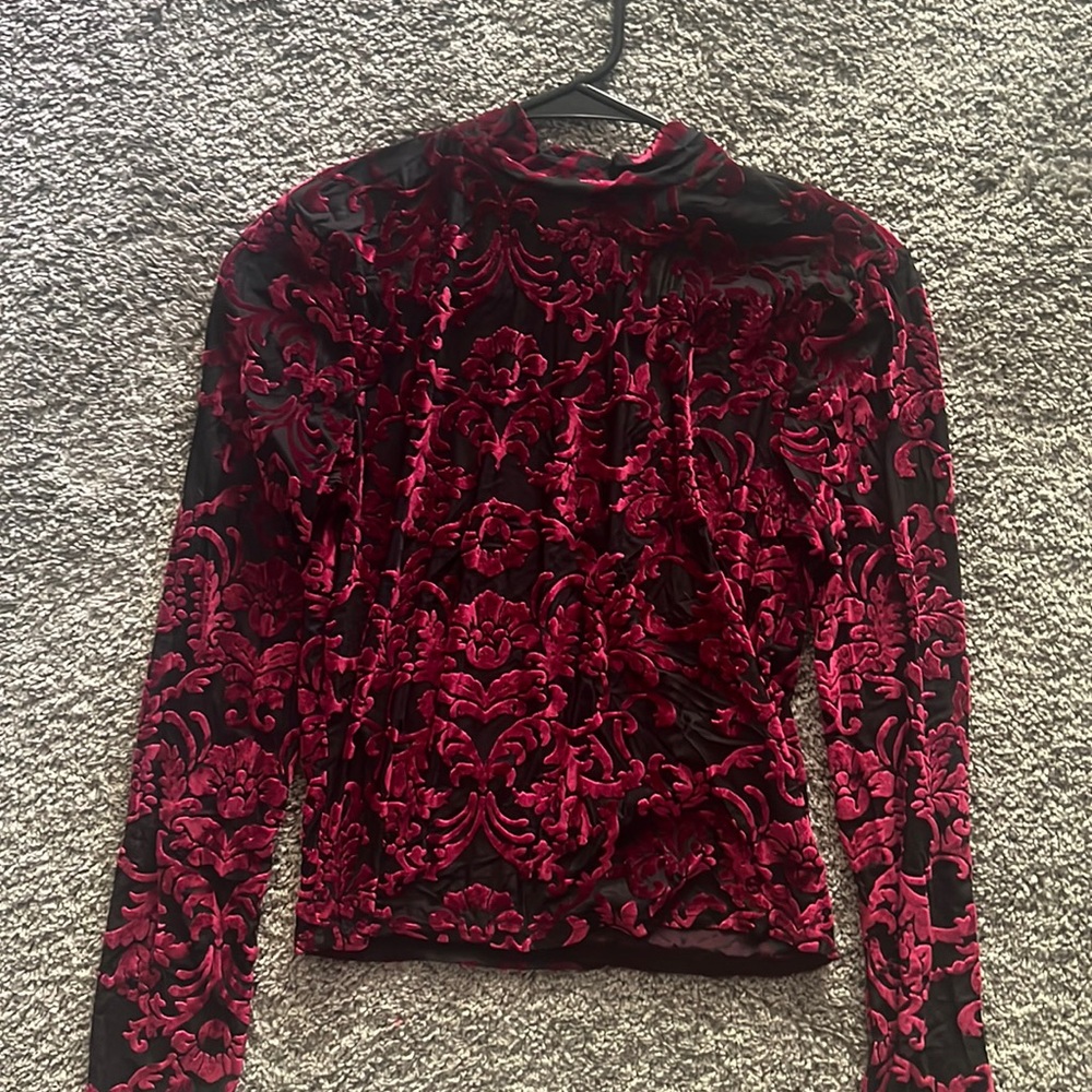 Buckle size Medium, see-through long sleeved crop top. Tags still on.